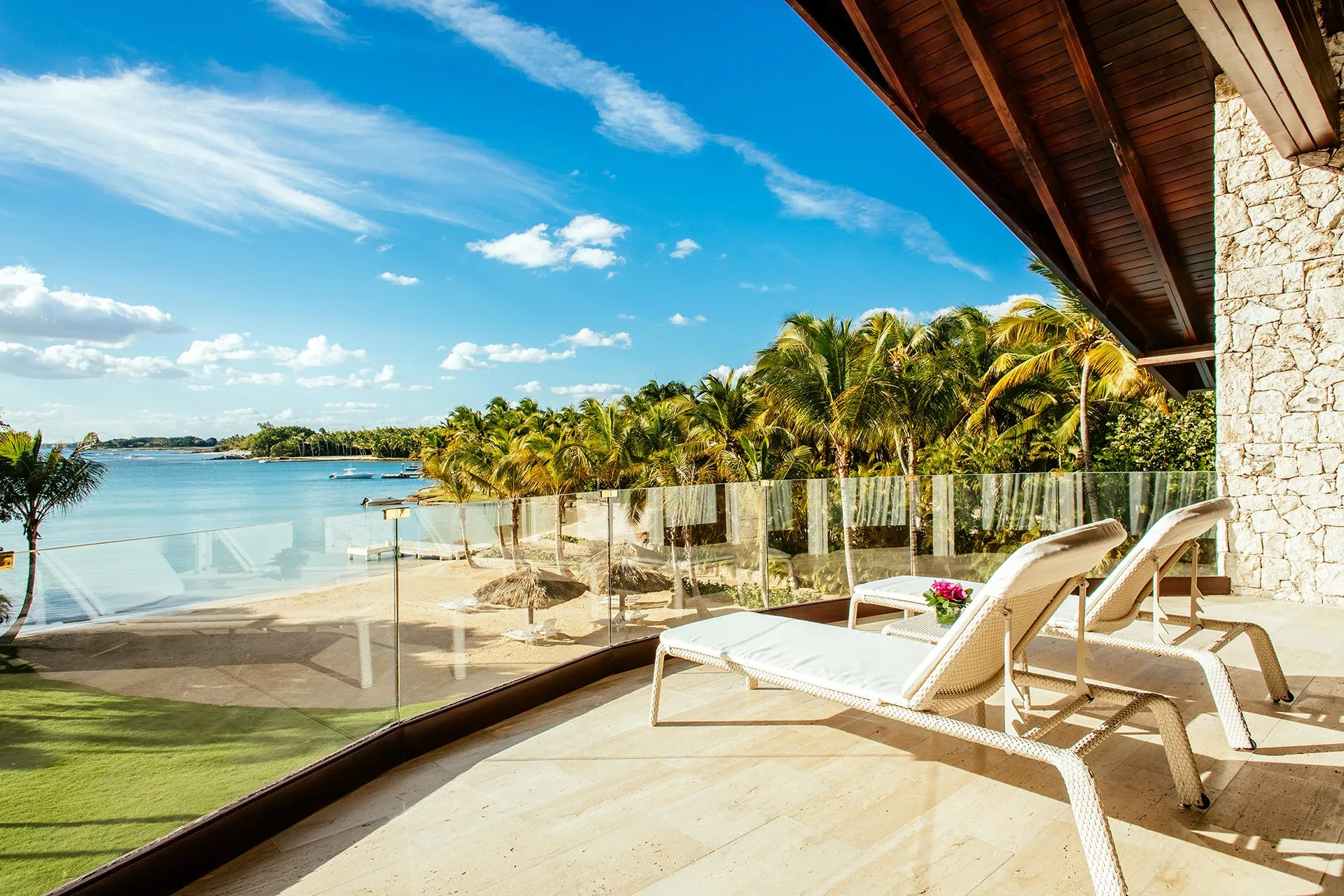 Beachfront terrace with sun loungers and sea views at Villa Punta Minitas 34, Casa de Campo La Romana