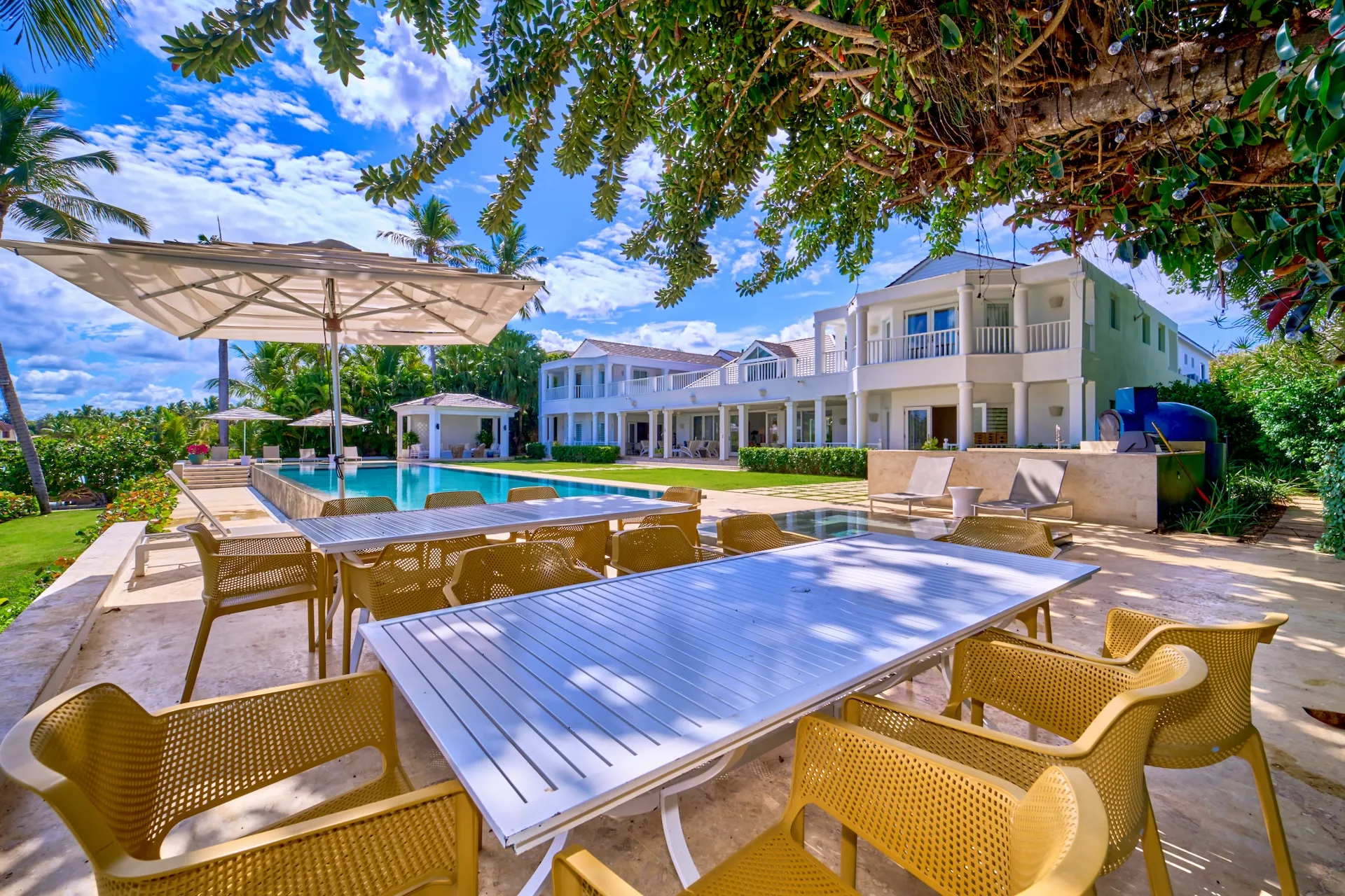 Outdoor dining terrace and pool at Punta Minitas 5 luxury villa, Casa de Campo Dominican Republic