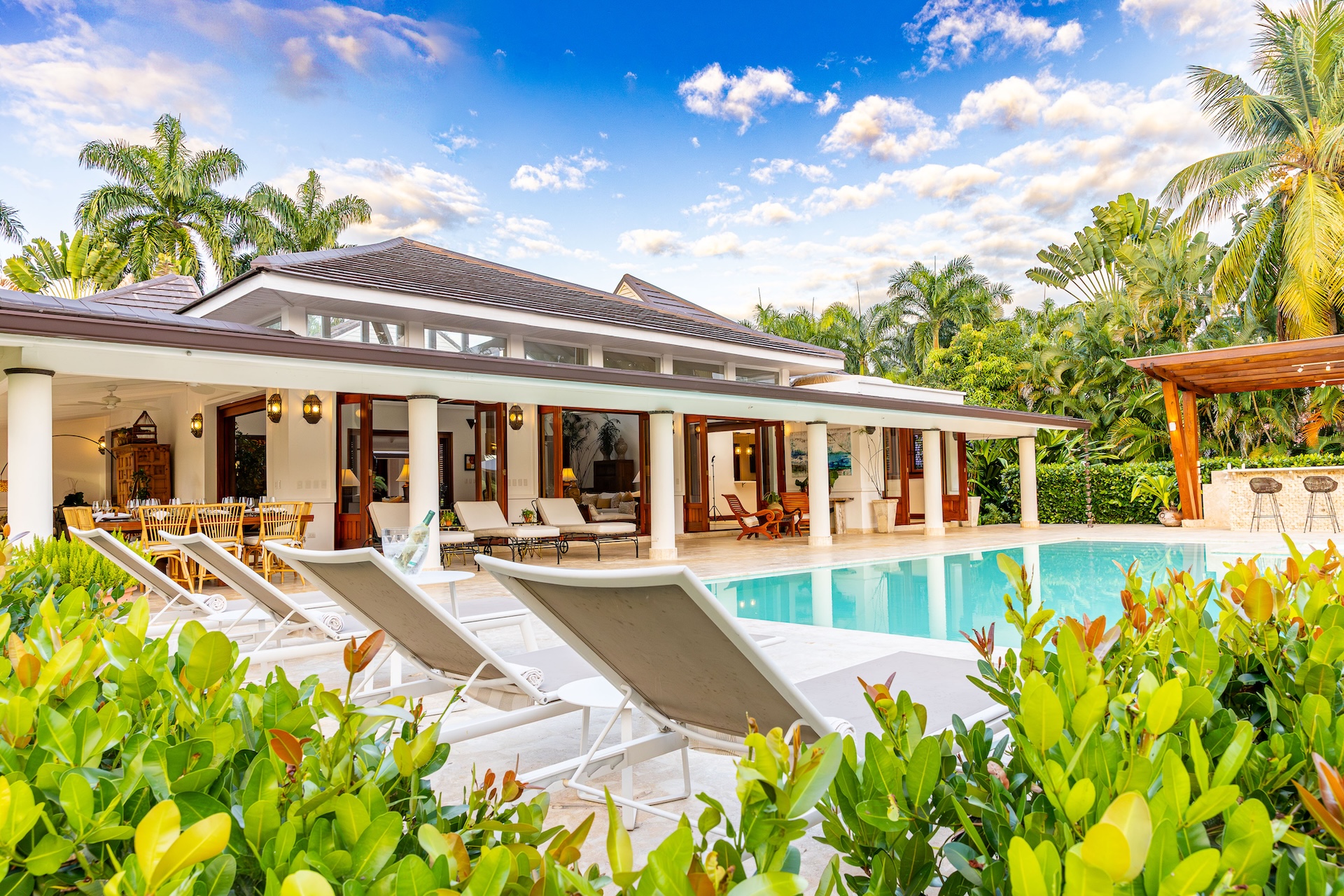 Pool terrace of a Casa de Campo villa available at the returning-guest rate