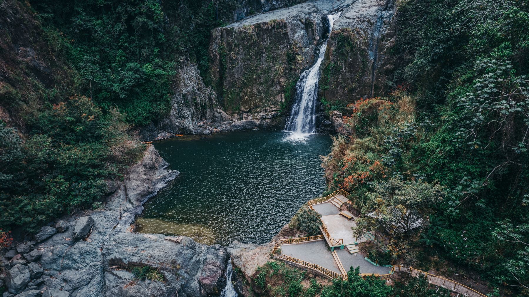 Aerial view of a waterfall and forest pool near Jarabacoa in the Cordillera Central